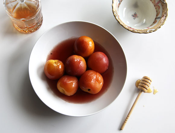 Nectarines poached in honey and black pepper