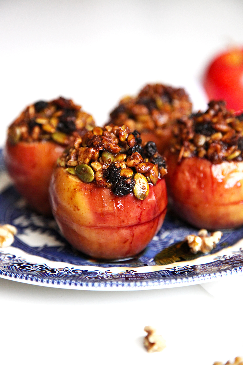 Healthy Baked Apples filled with fresh blackberries and topped with a crispy walnuts, pepitas, sultanas & maple