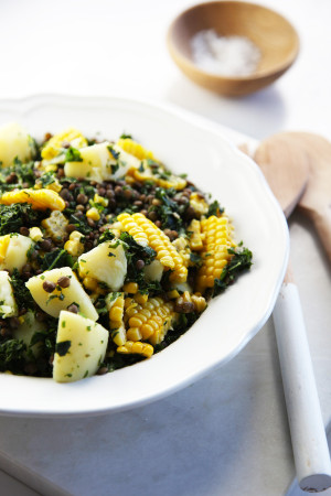 Warm lentil, potato & corn salad with yoghurt dressing