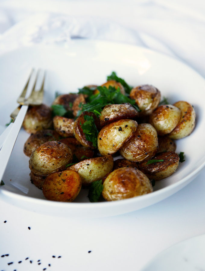Quick crispy potatoes - ready in no time and lightly spiced with nigella seeds, cumin seeds and coriander seeds.
