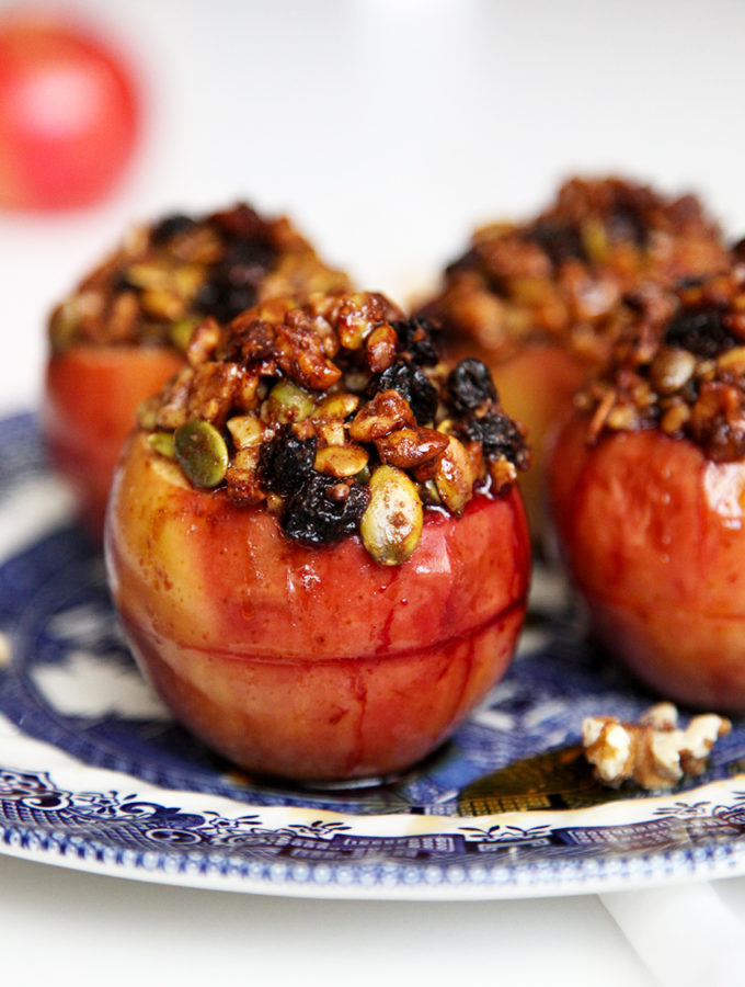 Healthy Baked Apples filled with fresh blackberries and topped with a crispy walnuts, pepitas, sultanas & maple