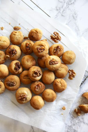 Somewhere between shortbread and a regular cookie these delicious little honey and walnut cookies are made using only 5 ingredients and are refined sugar-free.